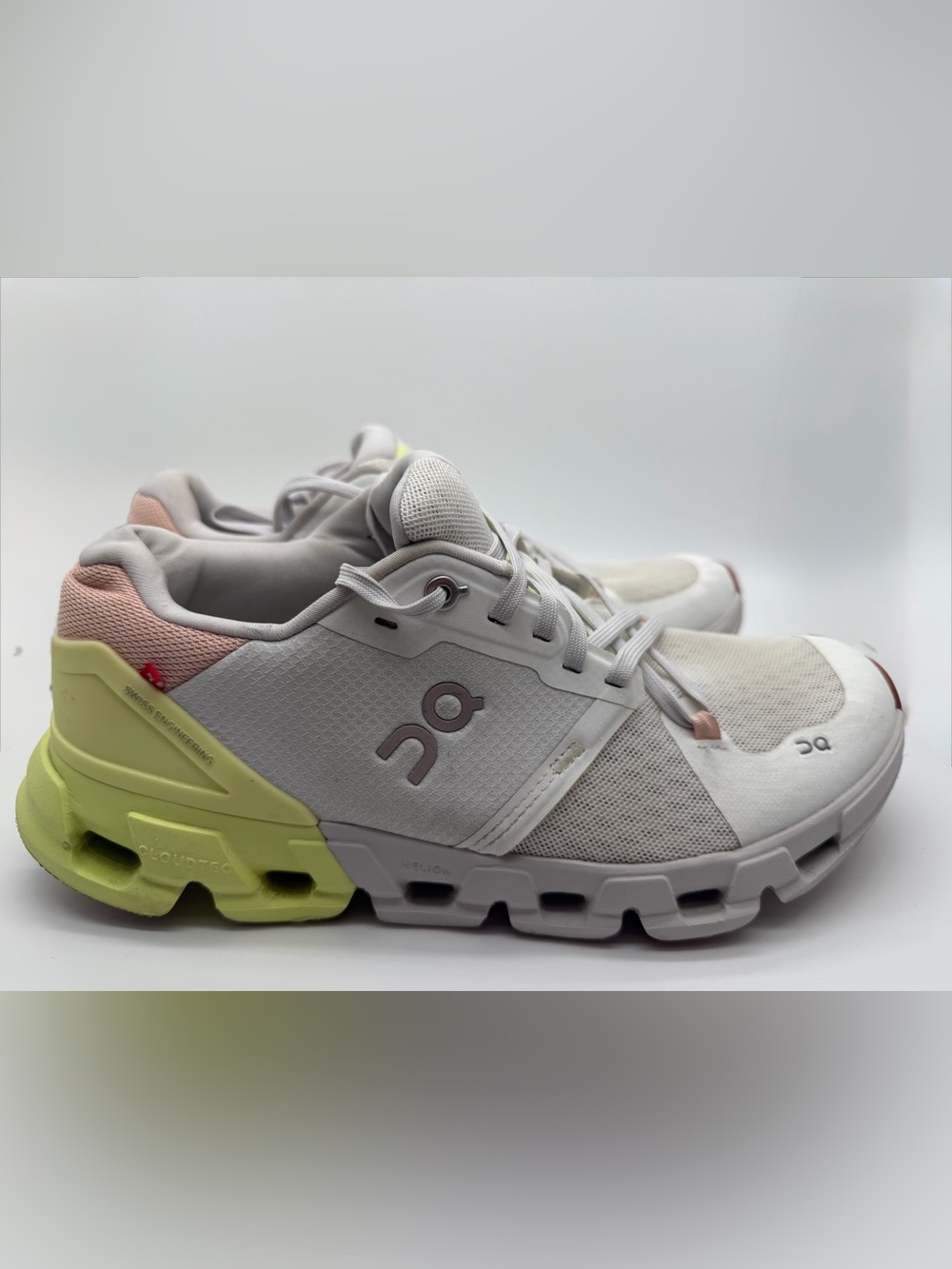 On Running wmns Sneakers in White with Pale Yellow and Soft Pink Accents